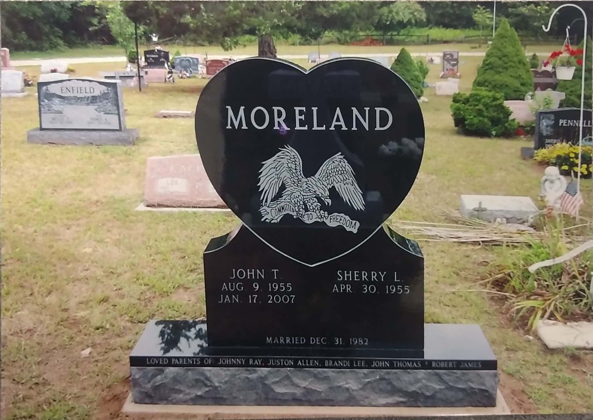 Engraved flat grave marker by Kienitz-Nix Memorials