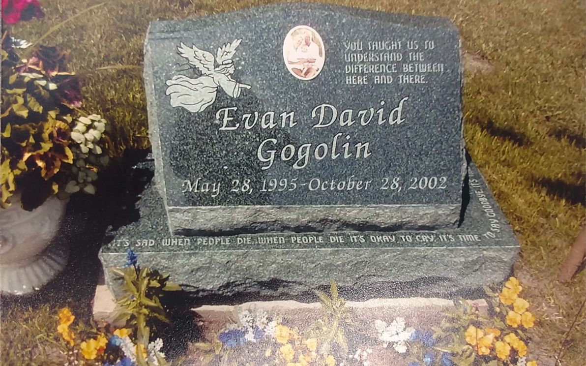 Flat grave marker by Kienitz-Nix Memorials in Reed City, MI